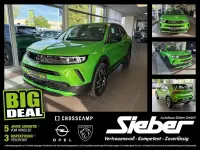 Gebraucht Opel Mokka Elegance 101 PS (74 kW) 2024 Lackierung matcha green/typ au SUV