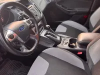 Używany Ford Focus 125 KM (91 kW) 2014 Czerwony Sedan/Limuzyna