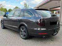 Używany Skoda Superb 200 KM (147 kW) 2011 Brązowy Kombi