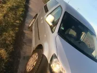 Second-hand VW Caddy 105 CP (77 kW) 2011 Argintiu Monovolum