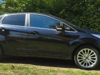 Gebraucht Ford Fiesta Titanium 70 PS (51 kW) 2011 Schwarz Kleinwagen