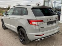 gebraucht Skoda Karoq 1.5 TSI Sportline NAVI+LED+SMART-LINK+AHK+PANORAMA+4xSHZ+VIRTUAL-COCKPIT+PDC+DAB+KAMERA+GRA+KEYLESS+BLUETOOTH