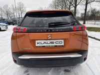 Second-hand Peugeot e-2008 Allure 100 kW (136 CP) 2021 Portocaliu SUV