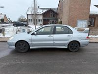 Second-hand Mitsubishi Lancer 98 CP (72 kW) 2007 Argintiu Berlinǎ