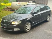 Używany Skoda Superb 125 KM (91 kW) 2013 Czarny Kombi
