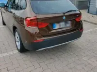 Używany BMW X1 177 KM (130 kW) 2012 Brązowy SUV