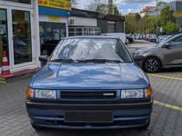 Second-hand Mazda 323 84 CP (61 kW) 1991 Albastru Berlinǎ