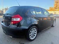 Second-hand BMW 116 116 CP (85 kW) 2006 Negru Hatchback