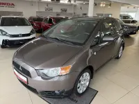 Gebraucht Mitsubishi Colt Motion 95 PS (69 kW) 2013 Braun Limousine
