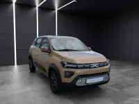 Używany Dacia Spring Extreme 47 kW (65 KM) 2024 Beżowy Hatchback