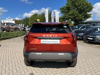 Neu Dacia Duster Journey 101 PS (74 kW) 2025 Terracottabraun SUV