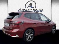 Gebraucht BMW 223 Active Tourer Performance 218 PS (160 kW) 2024 Piemont rot metallic Van / Kleinbus
