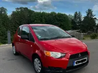 Gebraucht Mitsubishi Colt 75 PS (55 kW) 2009 Rot Kleinwagen