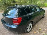 Używany BMW 118 143 KM (105 kW) 2014 Czarny Hatchback