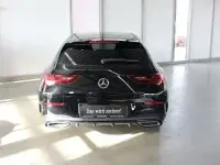 Gebraucht Mercedes CLA250 AMG Line Premium Plus 163 PS (119 kW) 2023 Metalliclack kosmosschwarz Coupé