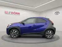 Gebraucht Toyota Aygo X Team 72 PS (52 kW) 2024 Ginger beige metallic/dach mys SUV