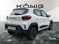 Gebraucht Dacia Spring Extreme 47 kW (65 PS) 2023 Kaolinweiß Kleinwagen