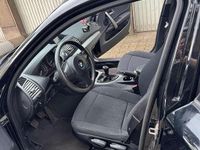 Second-hand BMW 116 122 CP (89 kW) 2011 Negru Hatchback