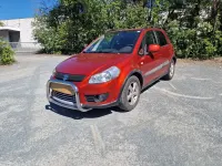 Gebraucht Suzuki SX4 120 PS (88 kW) 2009 Rot Limousine