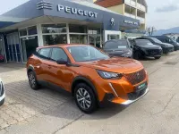 Gebraucht Peugeot e-2008 Active 100 kW (136 PS) 2023 Fusion orange SUV
