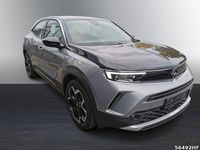 Gebraucht Opel Mokka-e Ultimate 100 kW (136 PS) 2022 Kontrast grau/quarz silber SUV