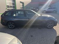 Second-hand BMW 318 Performance 143 CP (105 kW) 2014 Gri Break