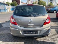 Gebraucht Opel Corsa Active 95 PS (69 kW) 2013 Muskatgrau/muskat braun(m2) Kleinwagen