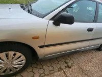 Gebraucht Mitsubishi Carisma 90 PS (66 kW) 1998 Silber Limousine