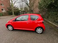 Gebraucht Toyota Aygo City 68 PS (50 kW) 2011 Rot Kleinwagen