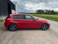 Gebraucht BMW 116 Sport Line 136 PS (100 kW) 2012 Rot Kleinwagen