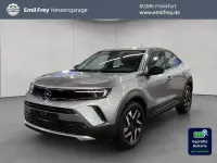 Gebraucht Opel Mokka-e Elegance 100 kW (136 PS) 2023 Kontrast grau metallic SUV