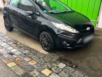 Gebraucht Ford Fiesta Ambiente 82 PS (60 kW) 2010 Schwarz Kleinwagen