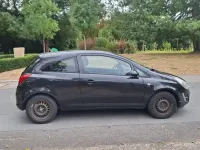 Gebraucht Opel Corsa 68 PS (50 kW) 2014 Schwarz Kleinwagen