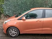Gebraucht Hyundai i10 Edition 68 PS (50 kW) 2014 Orange Kleinwagen