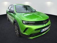 Gebraucht Opel Mokka Elegance 101 PS (74 kW) 2024 Lackierung matcha green/typ au SUV