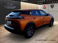 Second-hand Peugeot e-2008 Active 100 kW (136 CP) 2022 Portocaliu SUV