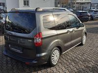 Gebraucht Ford Tourneo Courier Titanium 101 PS (74 kW) 2017 Magneticgrau (metallic) Van / Kleinbus