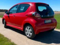Gebraucht Toyota Aygo 68 PS (50 kW) 2010 Rot Kleinwagen