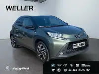 Gebraucht Toyota Aygo 72 PS (52 kW) 2023 Cardamon green / night sky black (gruen) Kleinwagen