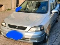 Second-hand Opel Astra 84 CP (61 kW) 2009 Argintiu Coupe