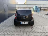 Gebraucht Daihatsu Sirion 70 PS (51 kW) 2010 Schwarz Kleinwagen