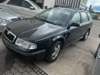 Używany Skoda Octavia 110 KM (80 kW) 2003 Czarny Kombi