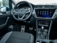 Gebraucht VW Touran Active 150 PS (110 kW) 2023 Caribbean blue metallic Van / Kleinbus