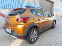 Gebraucht Dacia Sandero Comfort 91 PS (66 kW) 2023 Taklamakan orange metallic SUV