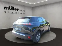 Gebraucht Peugeot e-2008 Active 100 kW (136 PS) 2022 Perla nera schwarz SUV