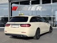 Gebraucht Mercedes E220 194 PS (142 kW) 2021 Hellelfenbein Kombi