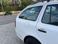 Second-hand Skoda Octavia Elegance 105 CP (77 kW) 2012 Alb Break