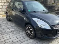 Gebraucht Suzuki Swift 80 PS (58 kW) 2012 Schwarz Kleinwagen