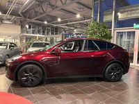 Gebraucht Tesla Model Y Standard Range 219 kW (299 PS) 2024 Midnight cherry red (metallic) SUV