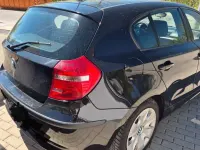 Second-hand BMW 116 122 CP (89 kW) 2009 Negru Hatchback
